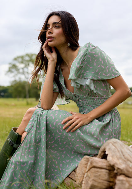 Light green V Neck Printed Midi dress with gathered waist and fluted sleeve