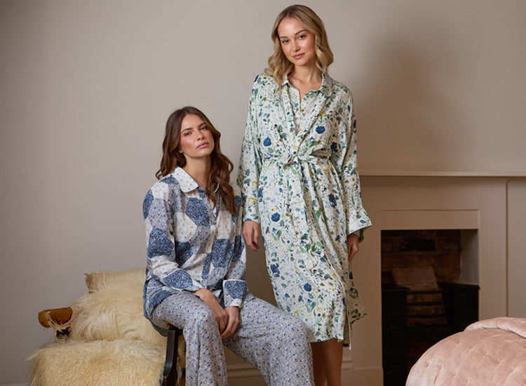 Models are wearing the Corina robe in pressed floral blue print and Evie PJ in blue aster patchwork print - mobile version